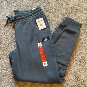 Reebok | blue cuffed joggers w/ front pockets & single back pocket
